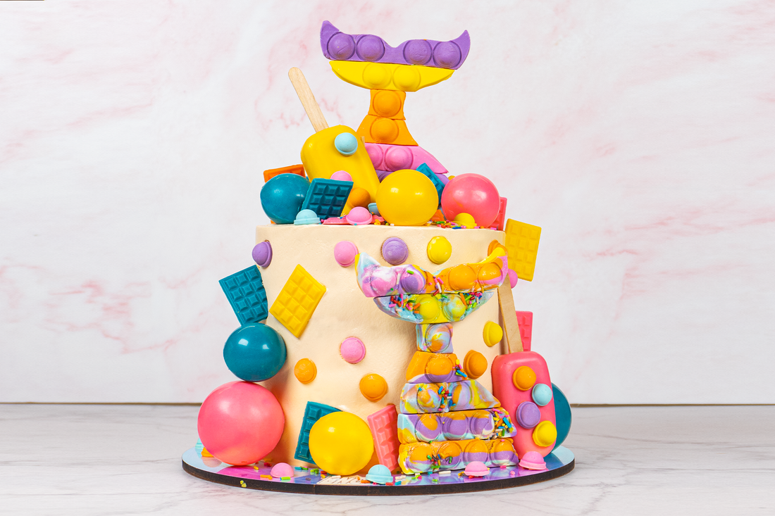 Learn how to decorate the new Candy Cake!